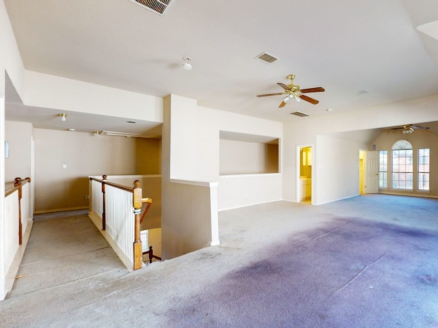 carpeted empty room with ceiling fan