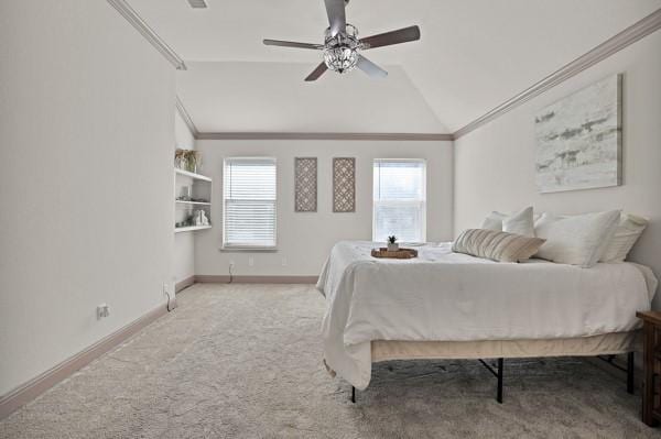 bedroom featuring crown molding, light colored carpet, ceiling fan, and vaulted ceiling