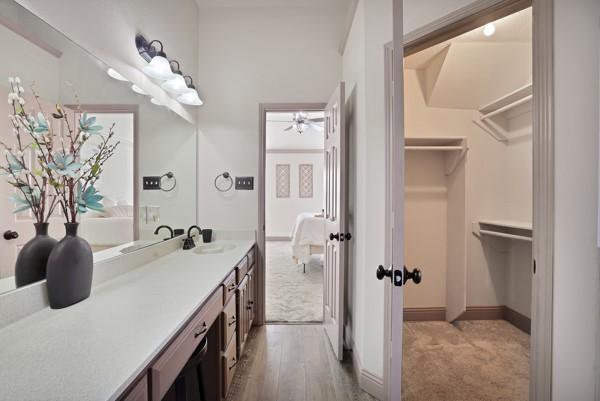 bathroom with vanity and hardwood / wood-style floors