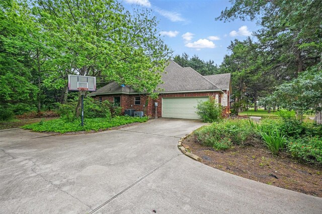 3421 Mindy Ln, Midlothian, TX 76065 - back of house with a shingled roof, a chimney, and brick siding