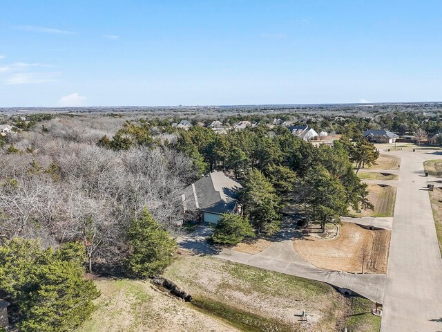3421 Mindy Ln, Midlothian, TX 76065 - empty room with visible vents, ornamental molding, light carpet, a raised ceiling, and a ceiling fan