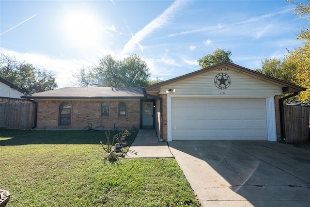 ranch-style house featuring a front yard and a garage