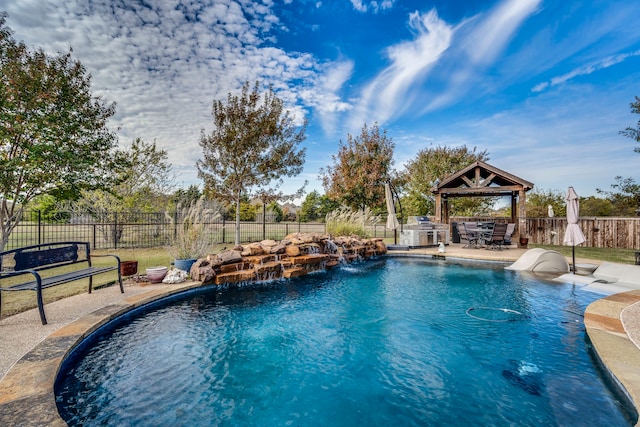 view of pool featuring a gazebo, a patio, and pool water feature