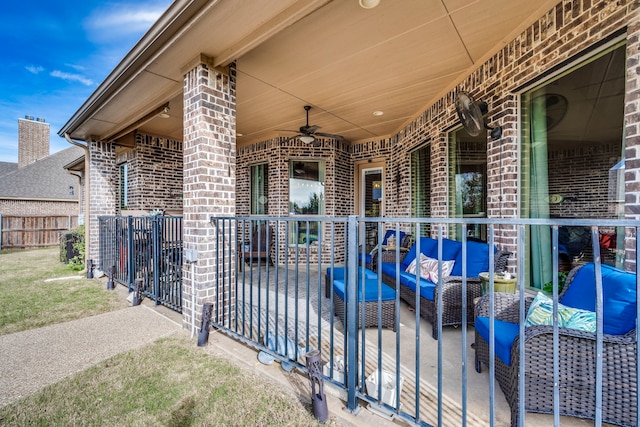 view of patio featuring ceiling fan and an outdoor living space