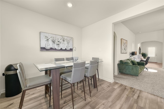 dining space featuring light wood-type flooring