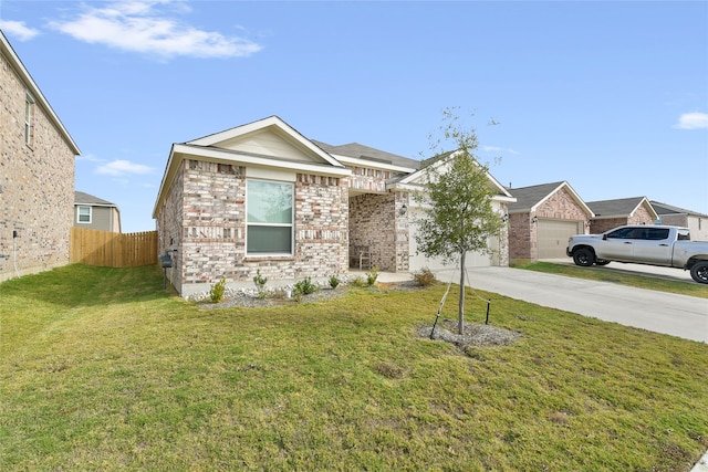 view of front of house featuring a garage and a front yard