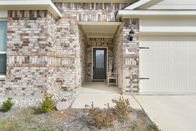 property entrance with a garage