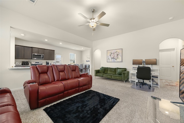 living room featuring ceiling fan