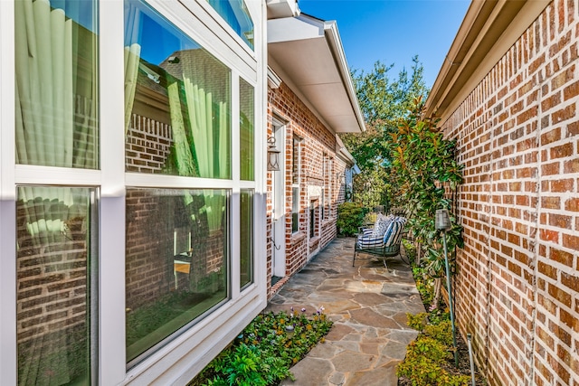 view of home's exterior with a patio