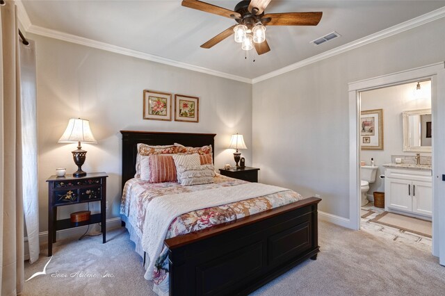 bedroom featuring connected bathroom, ceiling fan, sink, crown molding, and light colored carpet