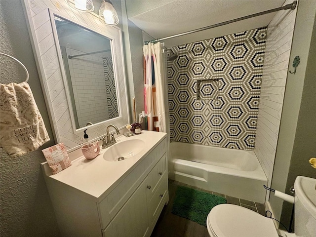 full bathroom featuring vanity, shower / bath combo, a textured ceiling, and toilet