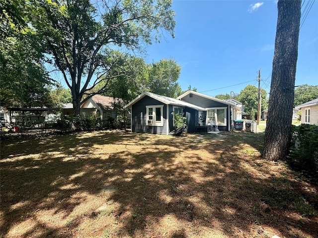 view of home's exterior featuring a yard