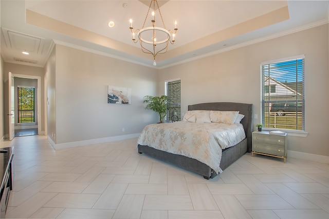 bedroom featuring a chandelier, a tray ceiling, and ornamental molding