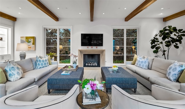 living room featuring beam ceiling