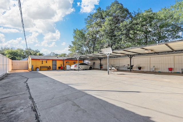 exterior space with a carport