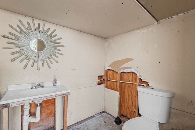 bathroom featuring sink and toilet