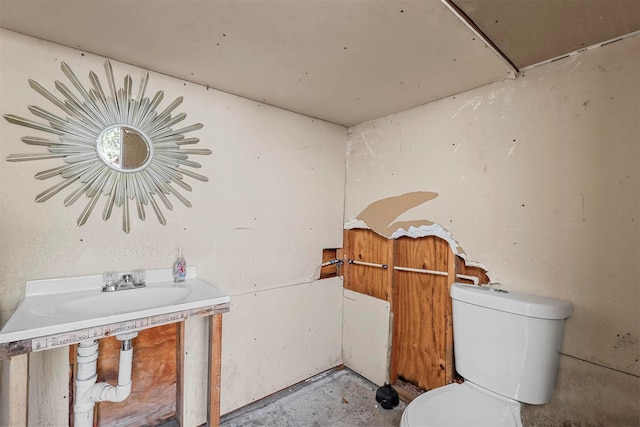 bathroom with toilet and sink