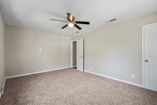 carpeted empty room with ceiling fan