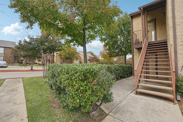 view of yard featuring stairway