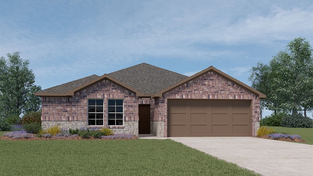 view of front of house featuring a garage and a front lawn