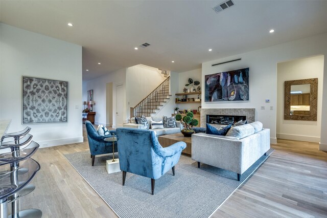 living room with light hardwood / wood-style floors