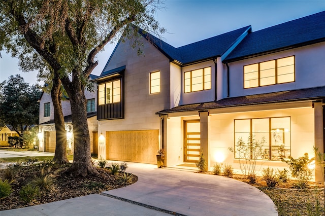 view of front of property with a garage