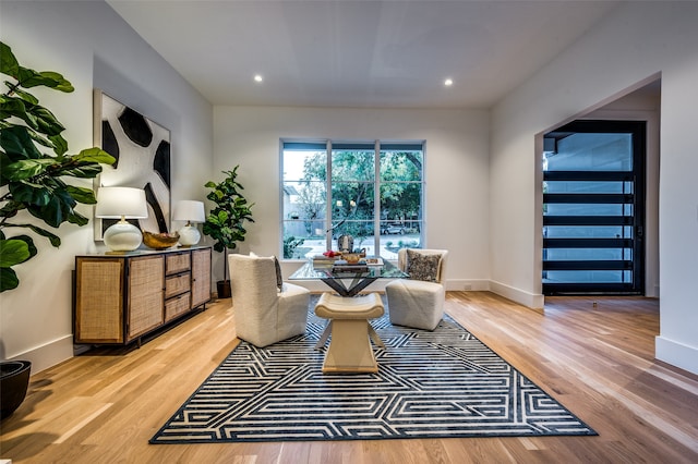 sitting room with light hardwood / wood-style floors