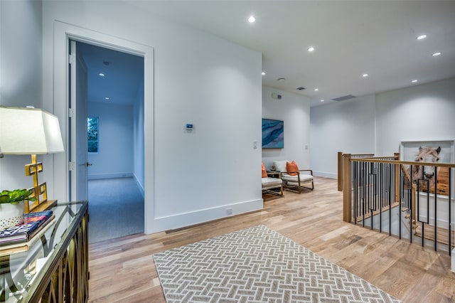 hall featuring light hardwood / wood-style floors