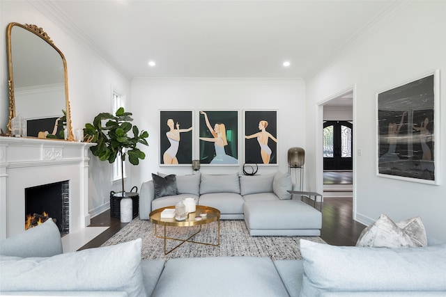 living room with hardwood / wood-style floors, french doors, and ornamental molding