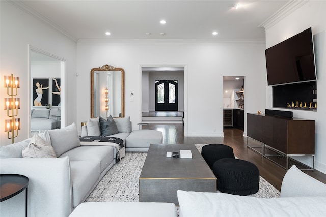 living room featuring hardwood / wood-style floors and ornamental molding