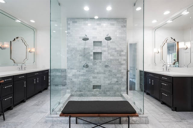 bathroom featuring a tile shower and ornamental molding