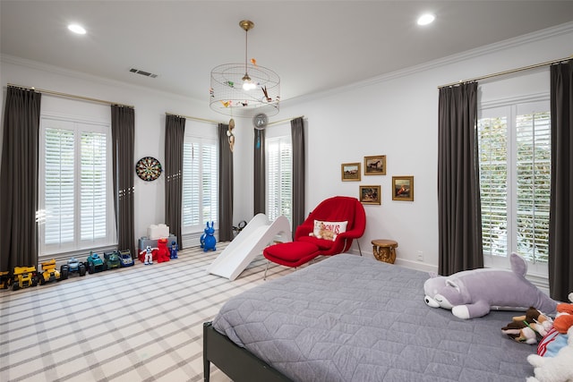 bedroom featuring carpet floors, crown molding, and multiple windows