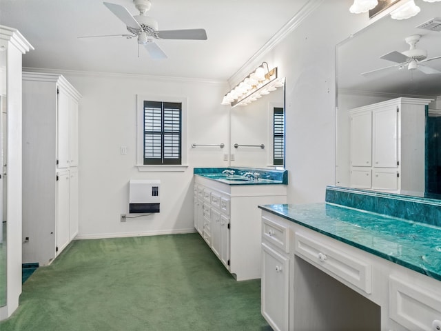 bathroom featuring heating unit, sink, ornamental molding, and ceiling fan