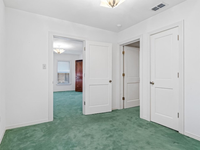 unfurnished bedroom featuring carpet