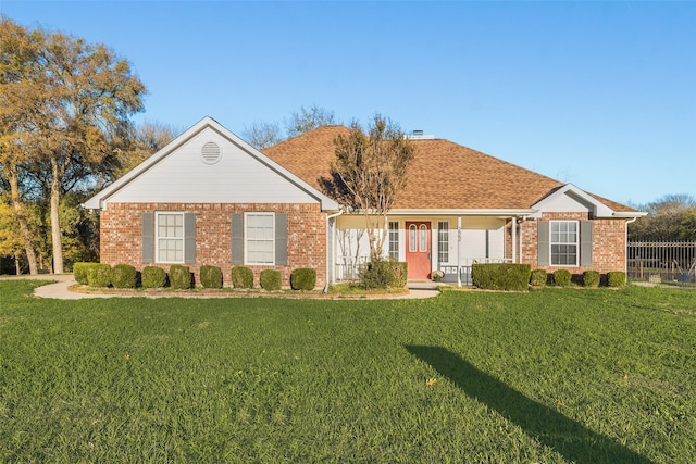 view of front of home with a front yard