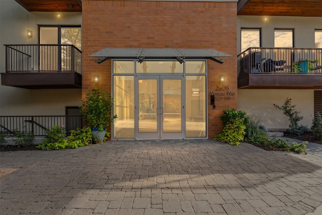 property entrance featuring french doors