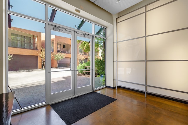 doorway to outside featuring a healthy amount of sunlight