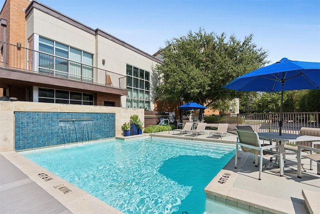 view of pool featuring a patio