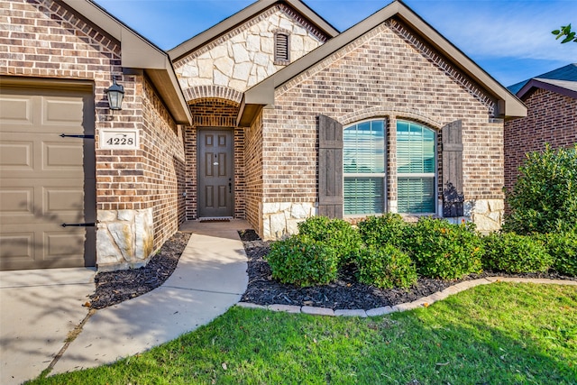 property entrance featuring a garage