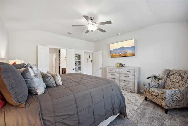 bedroom with ceiling fan, light colored carpet, and lofted ceiling