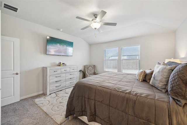 carpeted bedroom featuring ceiling fan and lofted ceiling