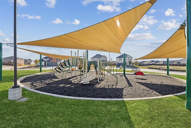 view of playground featuring a lawn