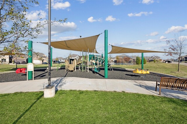 view of jungle gym with a yard