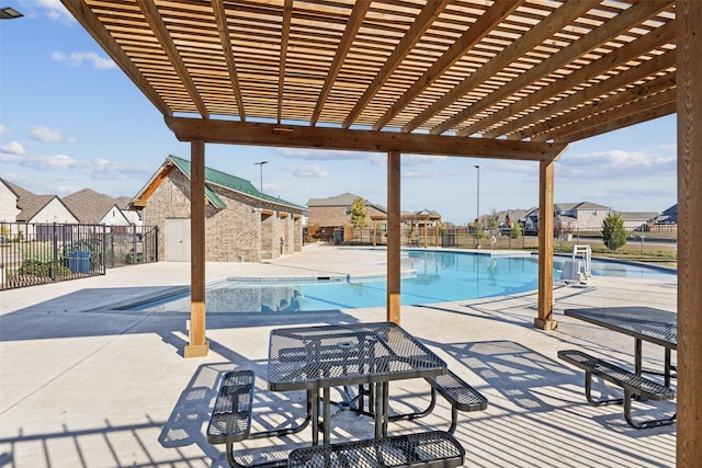 view of pool featuring a pergola and a patio area