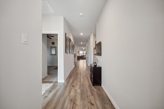 hallway featuring light hardwood / wood-style floors