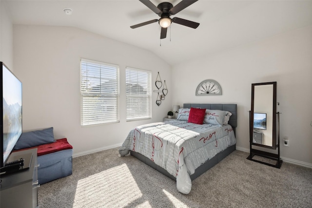 carpeted bedroom featuring vaulted ceiling and ceiling fan