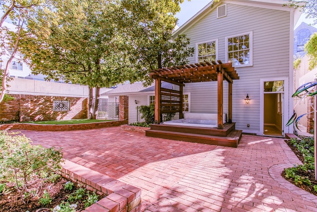 exterior space featuring a pergola and a patio