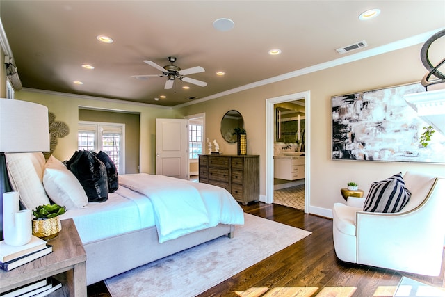 bedroom featuring ensuite bathroom, ceiling fan, dark hardwood / wood-style flooring, and crown molding