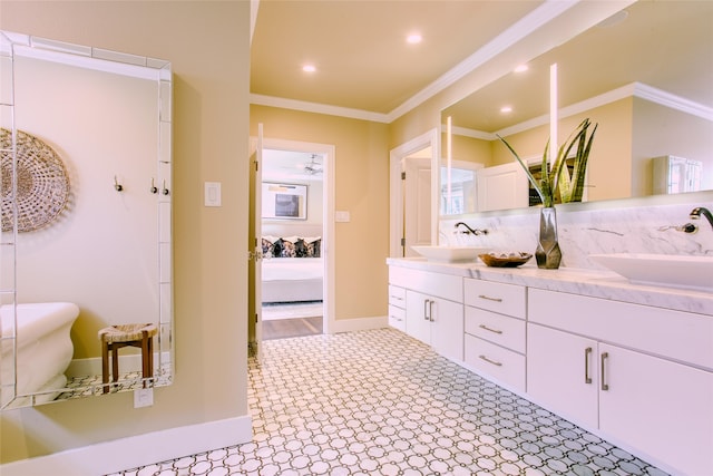 bathroom featuring vanity and ornamental molding