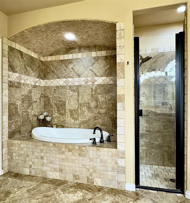 3390 Zion Hill Rd, Weatherford, TX 76088 - full bath with a garden tub, a shower stall, and tile walls